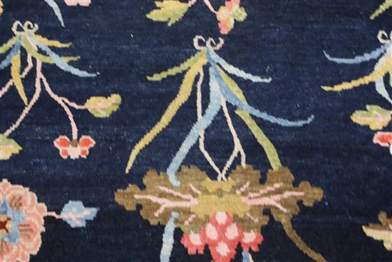 A Tibetan twelve plant rug, 5ft 7in. x 3ft 1in.